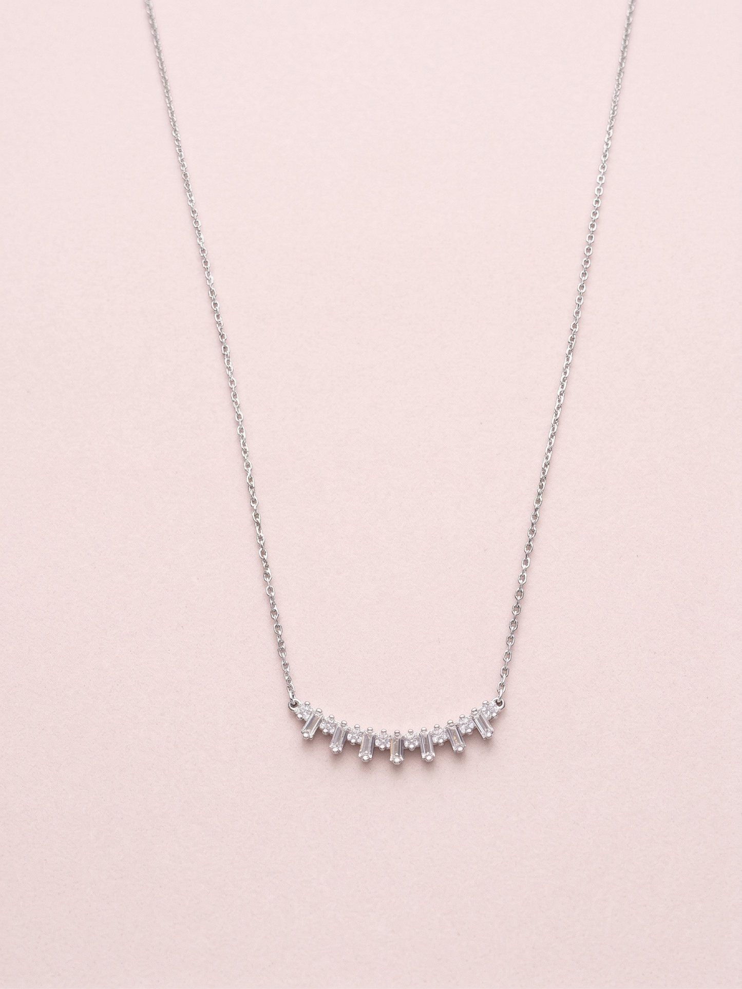 elegant silver-tone baguette crystal curve bar chain pendant