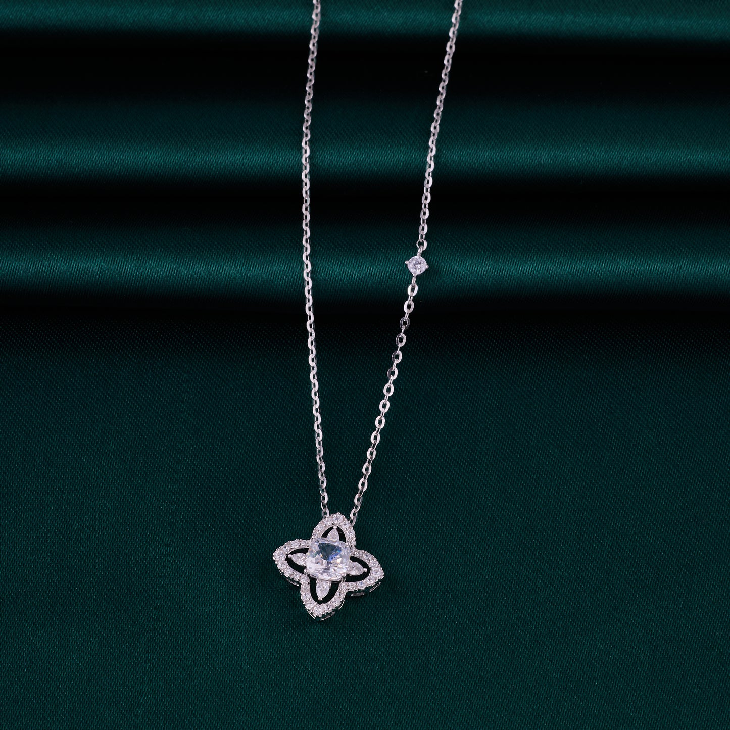 elegant four-petal halo crystal pendant chain in 92.5 sterling silver