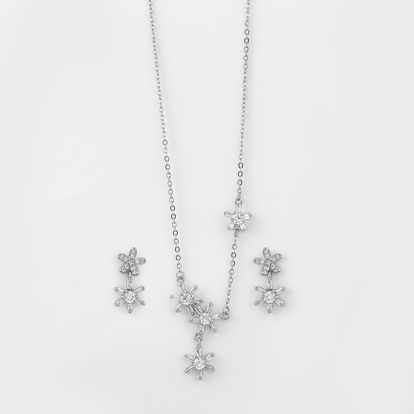 elegant snowflake cz pendant necklace with matching earrings in 92.5 sterling silver