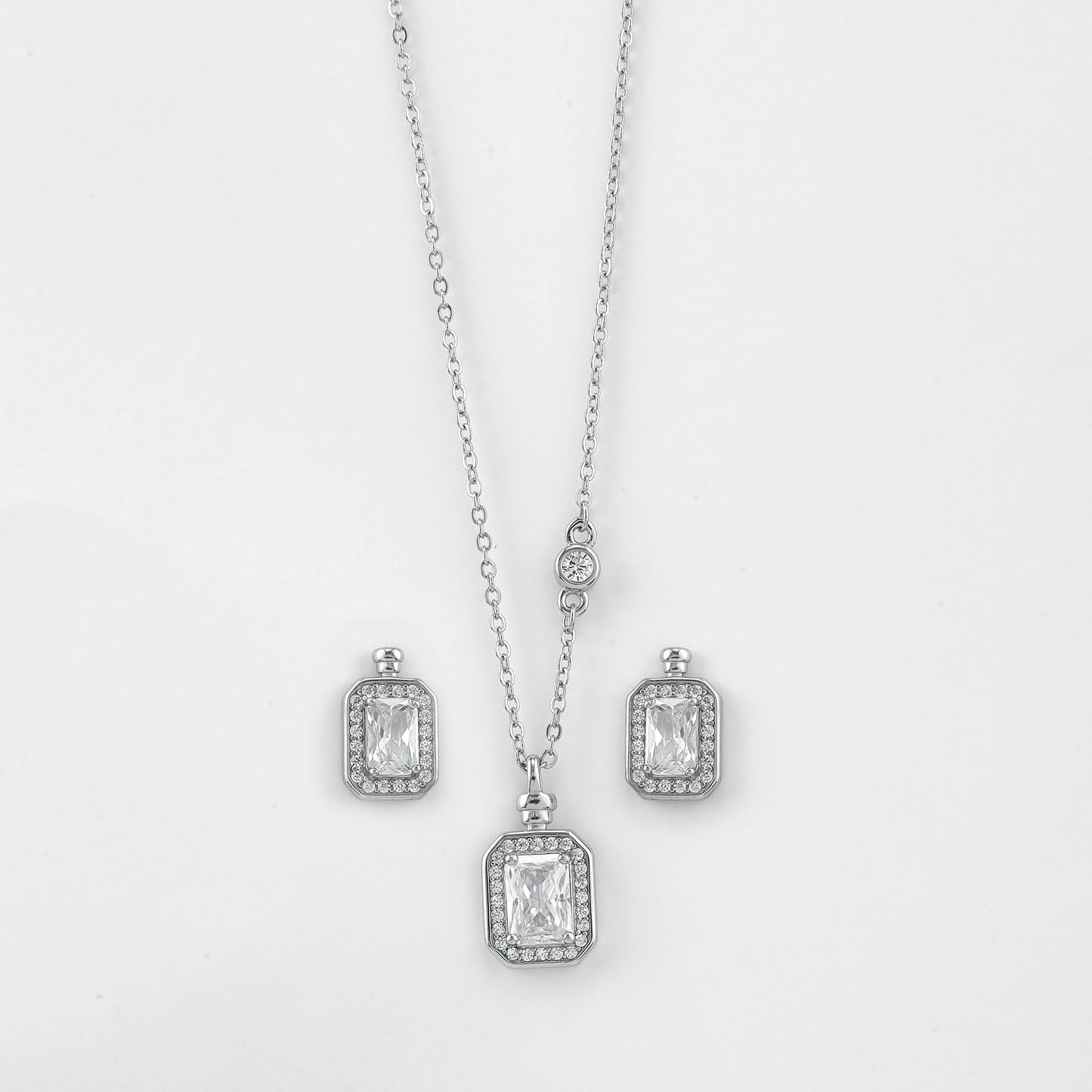 elegant emerald-cut cz pendant necklace with matching stud earrings in 92.5 sterling silver