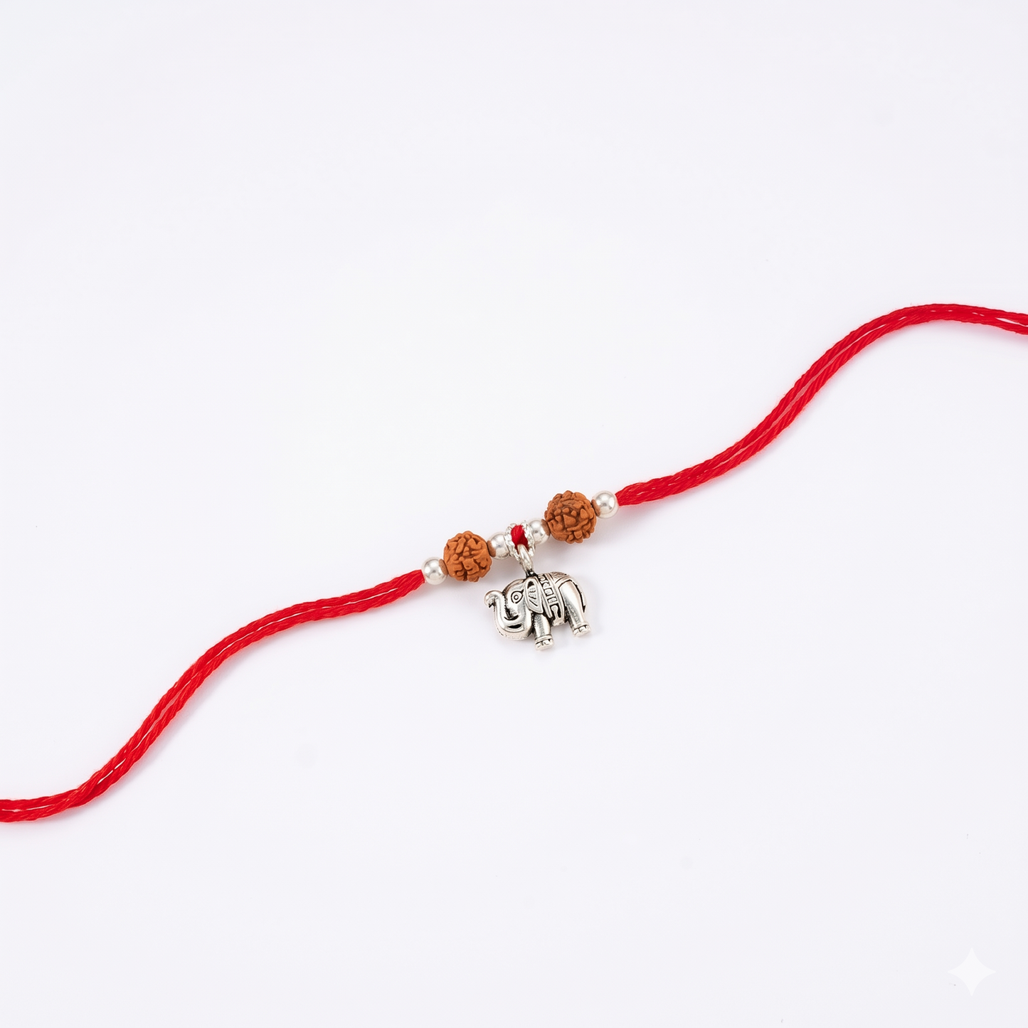 rudraksha silver elephant charm rakhi