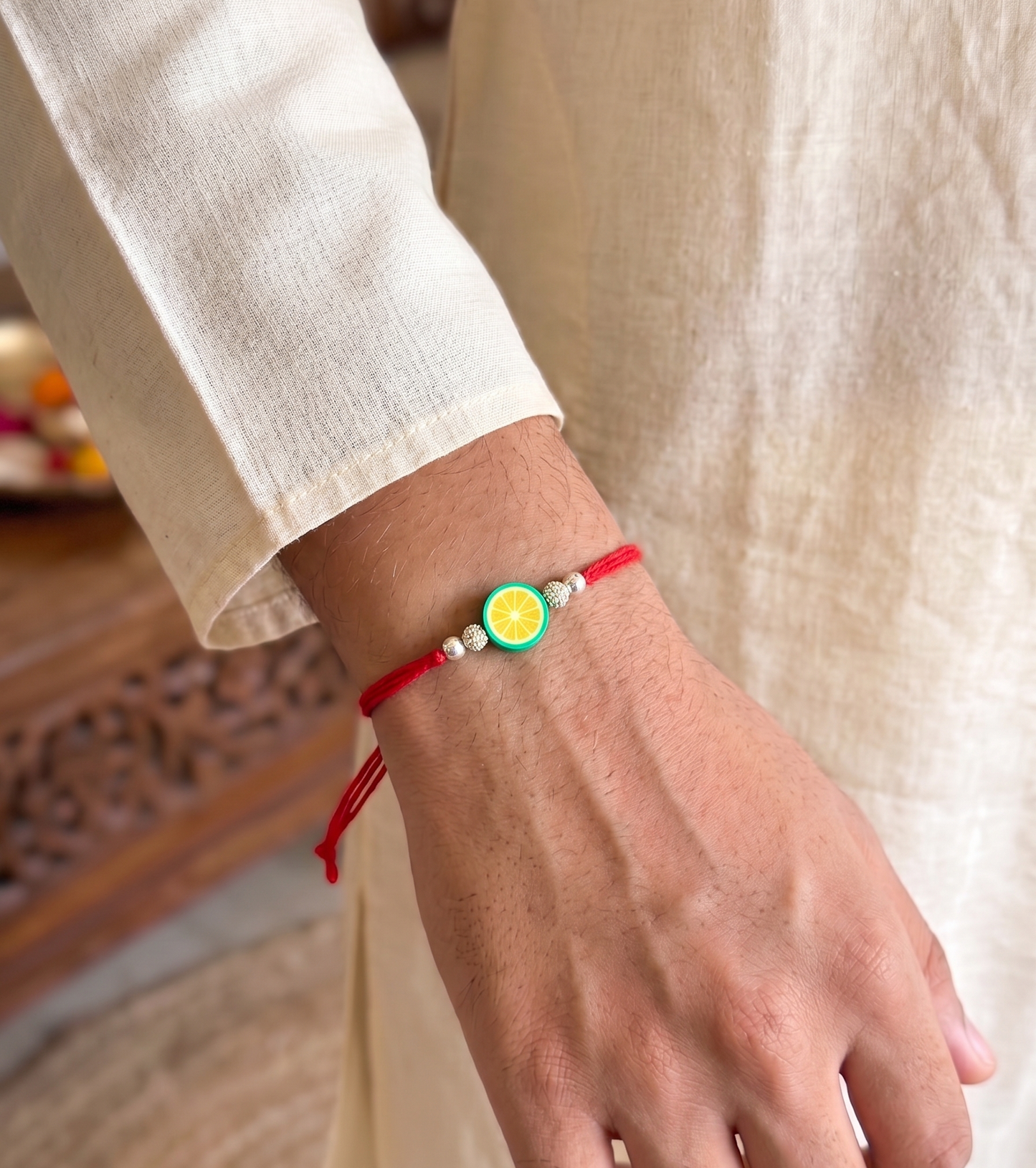 lemon slice charm sparkle rakhi