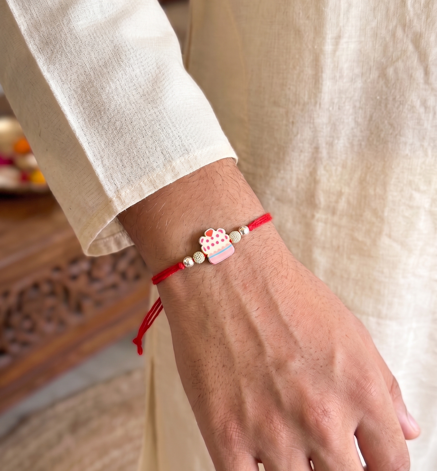 pink cupcake charm sparkle rakhi