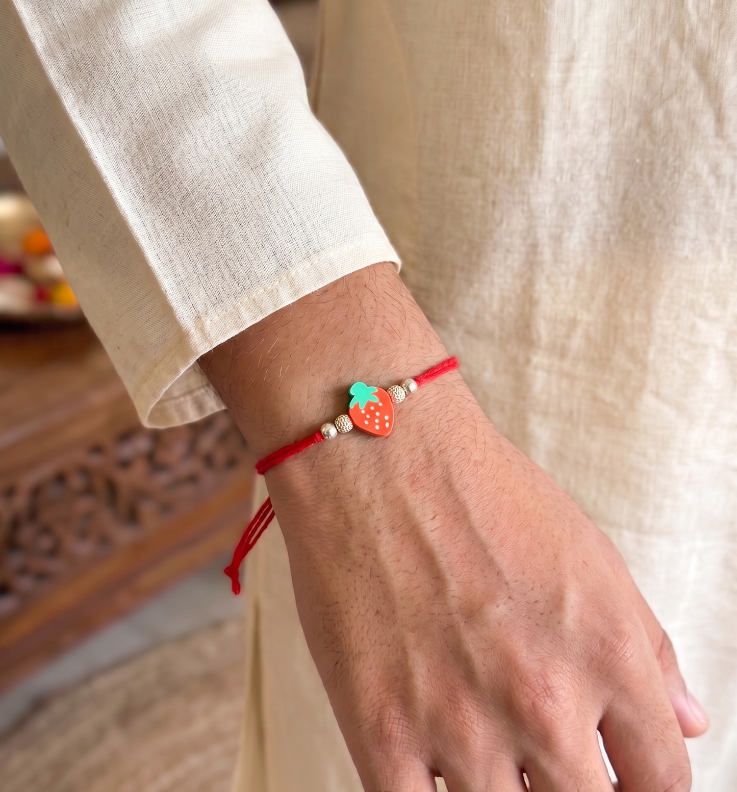 strawberry charm sparkle rakhi