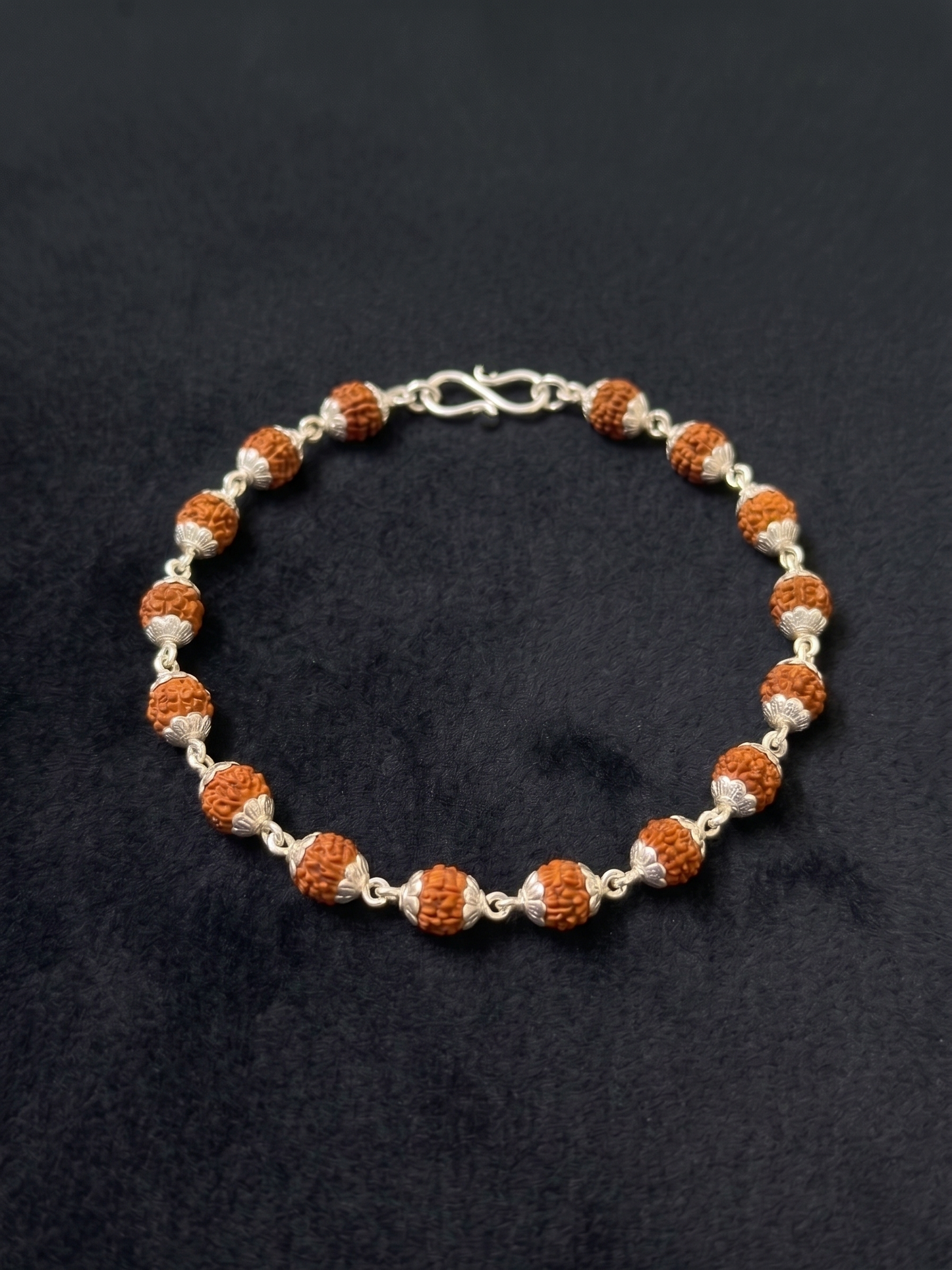 traditional rudraksha and silver bead bracelet