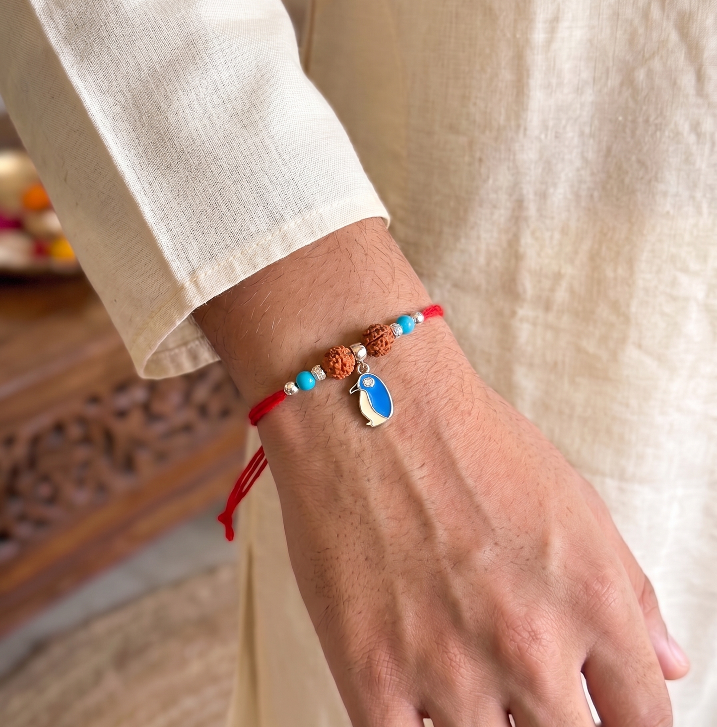 blue penguin rudraksha rakhi