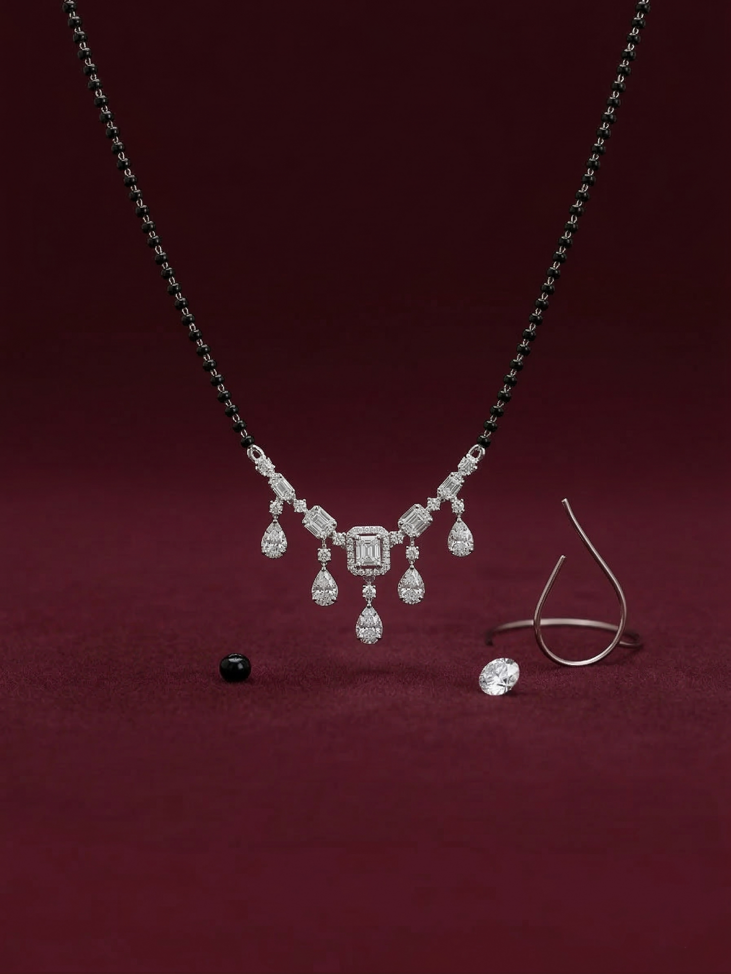 elegant silver-tone baguette & teardrop crystal mangalsutra with black beaded chain