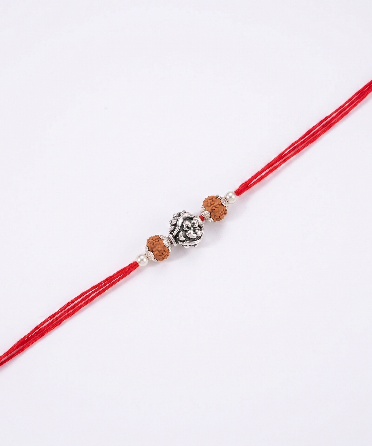 rudraksha silver elephant charm rakhi