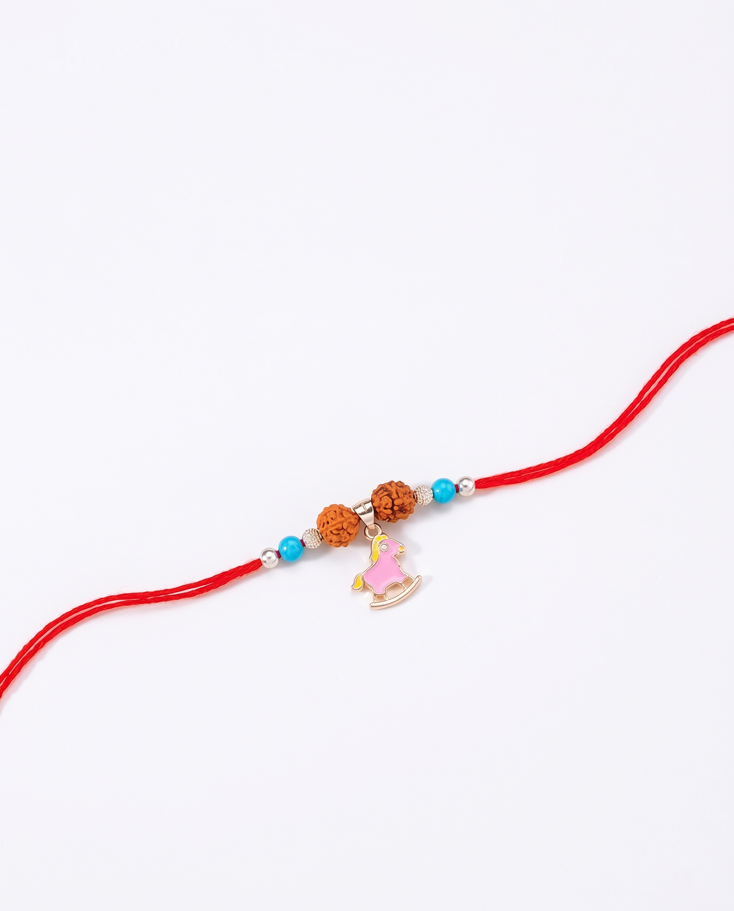 playful rocking horse rudraksha silver rakhi