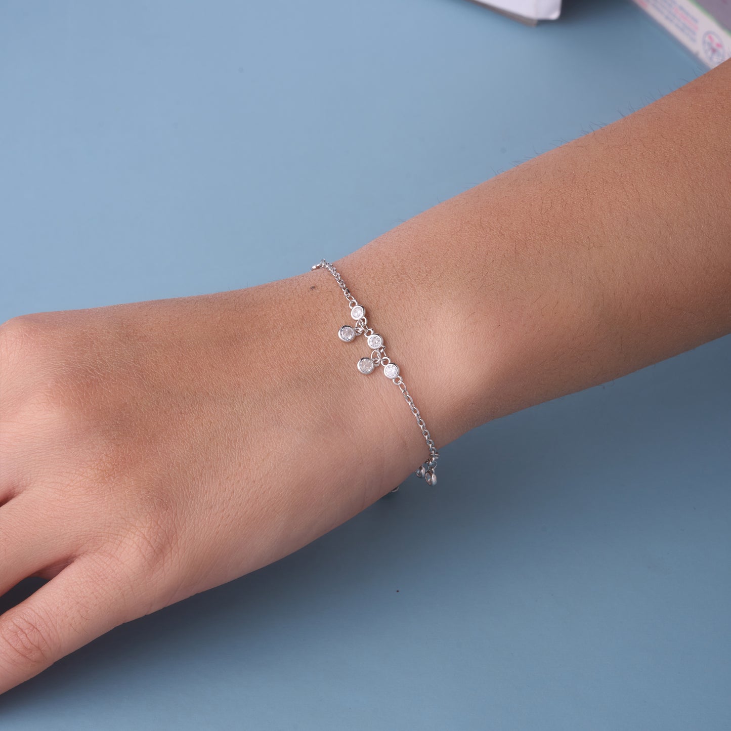 elegant dangling bezel charm bracelet in pure 92.5 sterling silver – adjustable fit