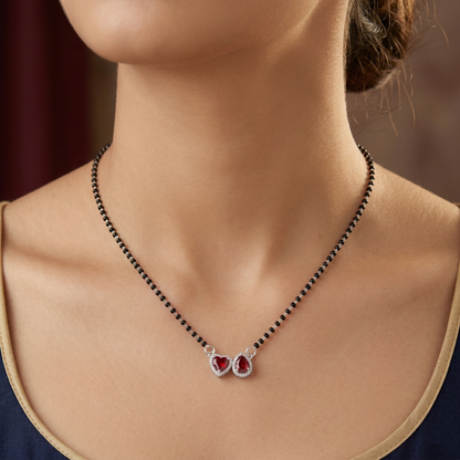 Elegant Silver-Tone Mangalsutra with Black Beads and Dual Heart & Teardrop Halo Pendants