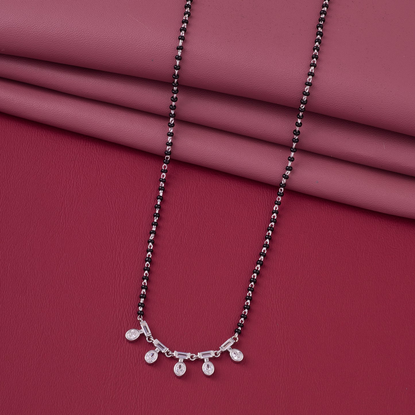 elegant black beaded mangalsutra with cz bar & drop charm design