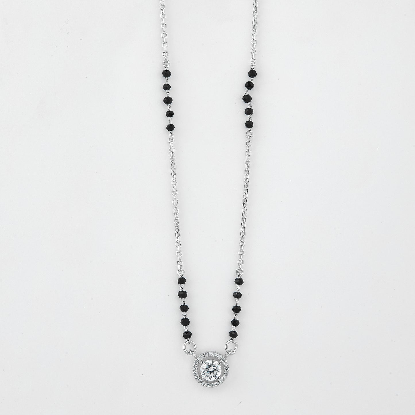 elegant silver-tone mangalsutra with black beads and sparkling double halo round pendant