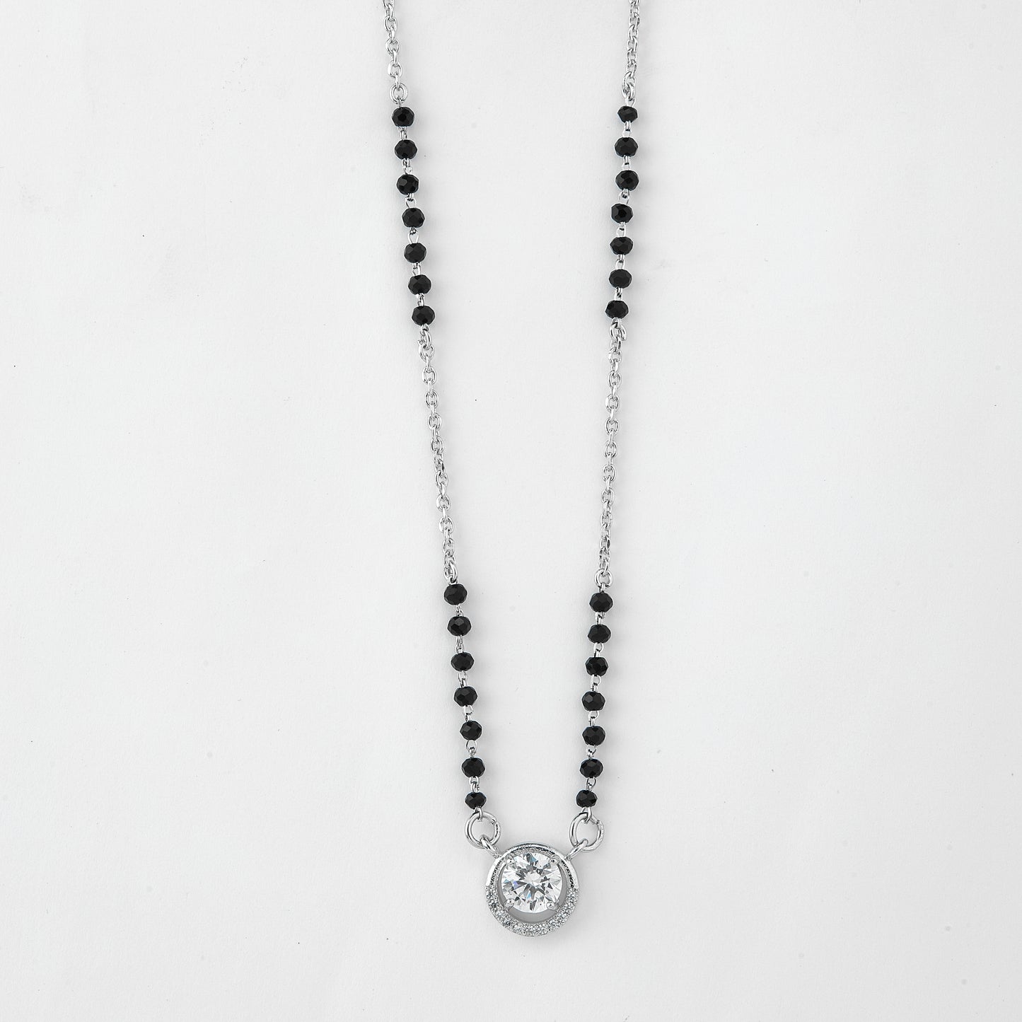 chic silver-tone mangalsutra with black beads and sparkling circular solitaire pendant