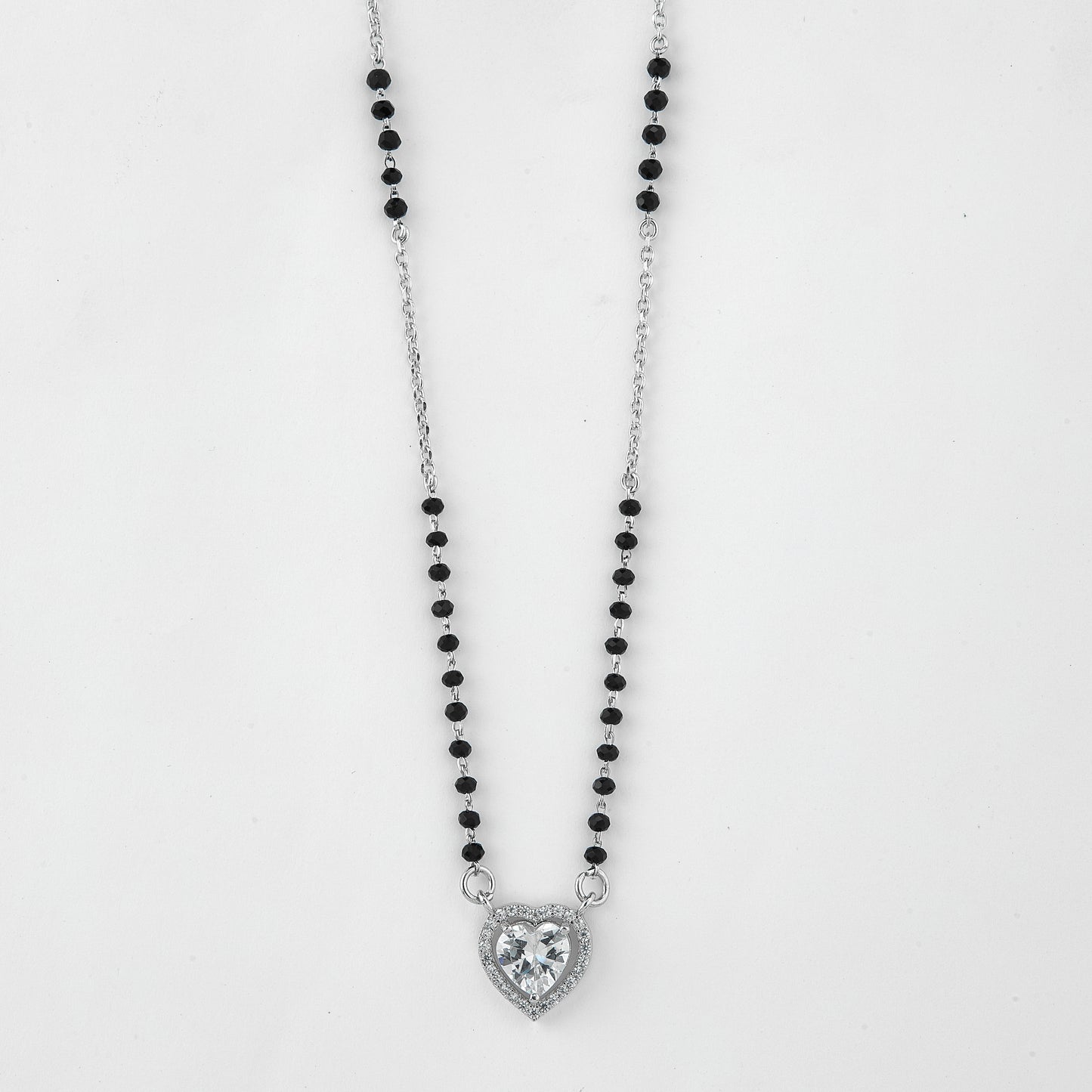 elegant silver-tone mangalsutra with black beads and sparkling heart-shaped halo pendant