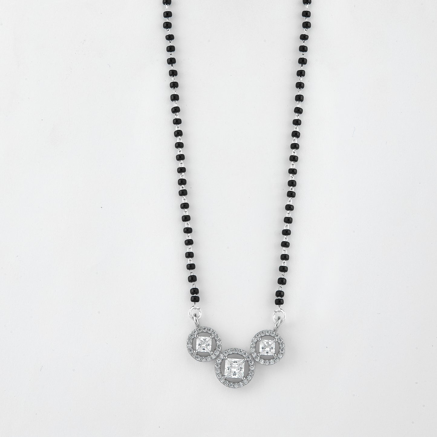 elegant silver-tone mangalsutra with black beads and triple square halo pendant design