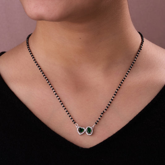 Elegant Silver-Tone Mangalsutra with Black Beads and Dual Heart & Oval Halo Pendants