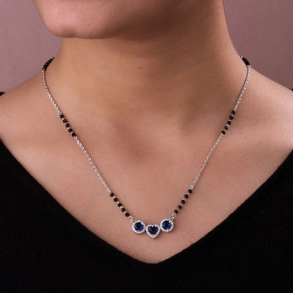 Elegant Silver-Tone Mangalsutra with Black Beads and Triple Blue Stone Heart Pendant
