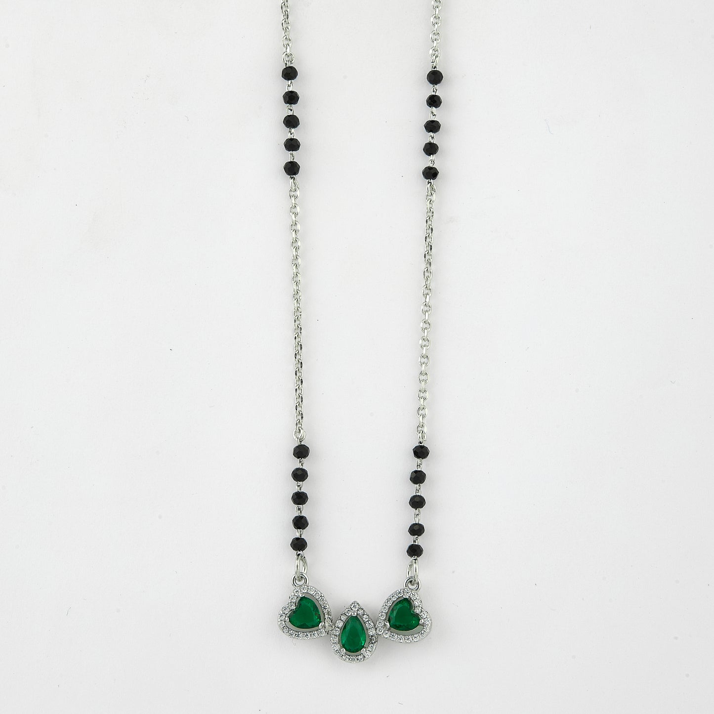 elegant silver-tone mangalsutra with black beads and triple teardrop stone pendant