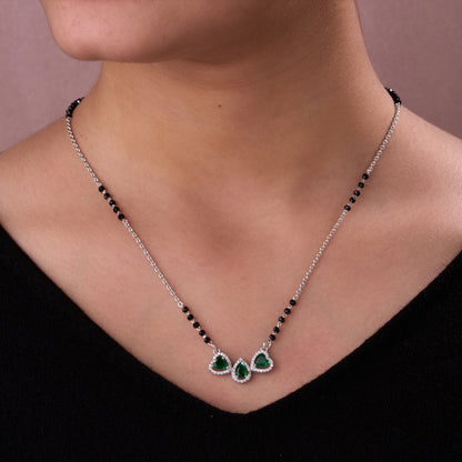 Elegant Silver-Tone Mangalsutra with Black Beads and Triple Teardrop Stone Pendant