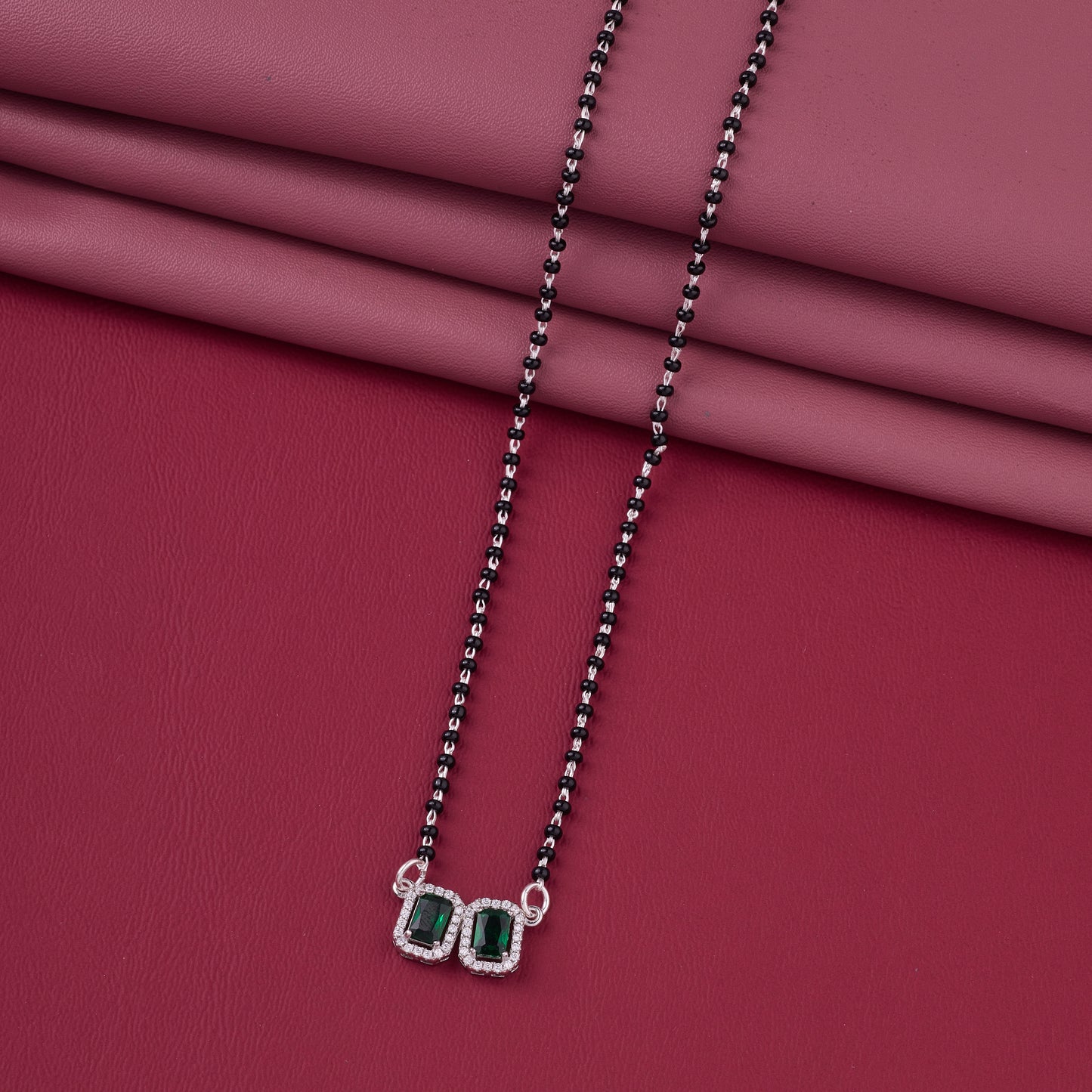 elegant silver-tone mangalsutra with black beads and dual rectangular halo pendants