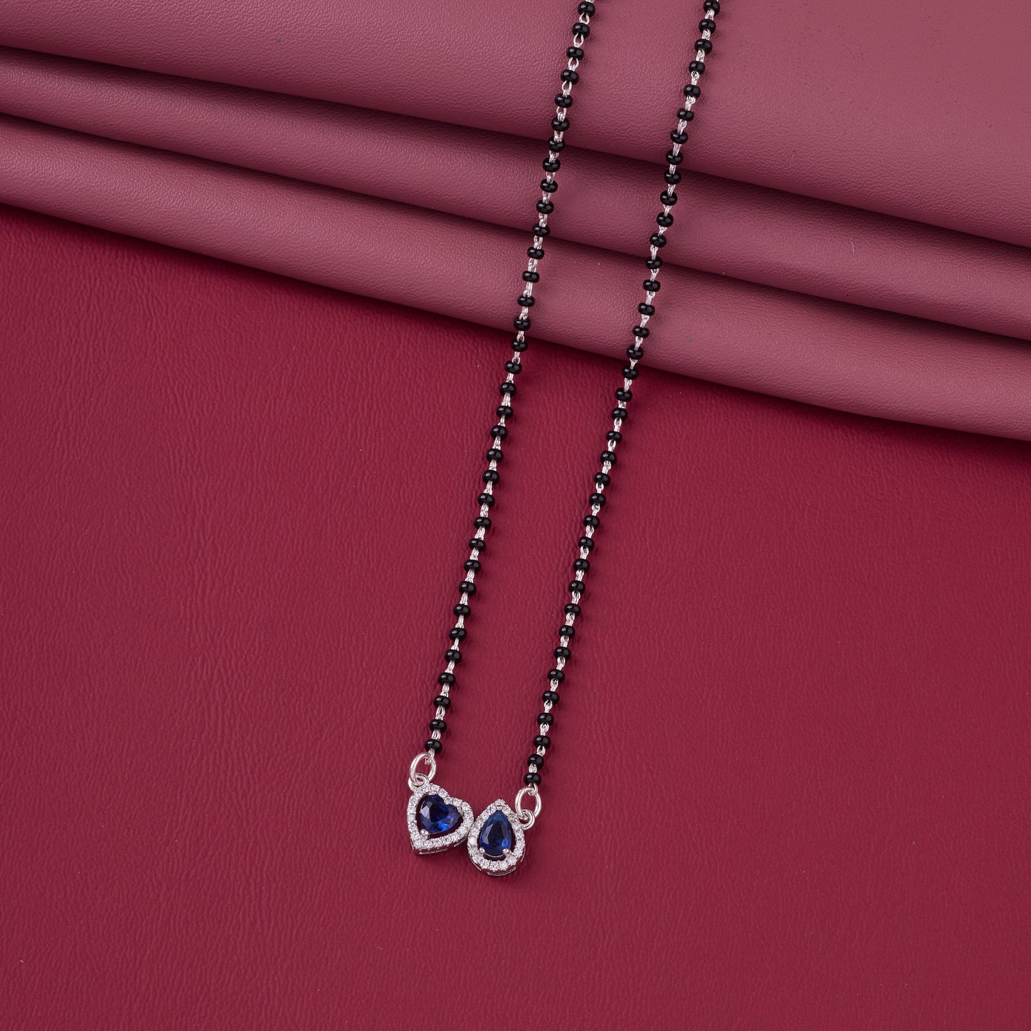 elegant silver-tone mangalsutra with black beads and dual heart & teardrop halo pendants