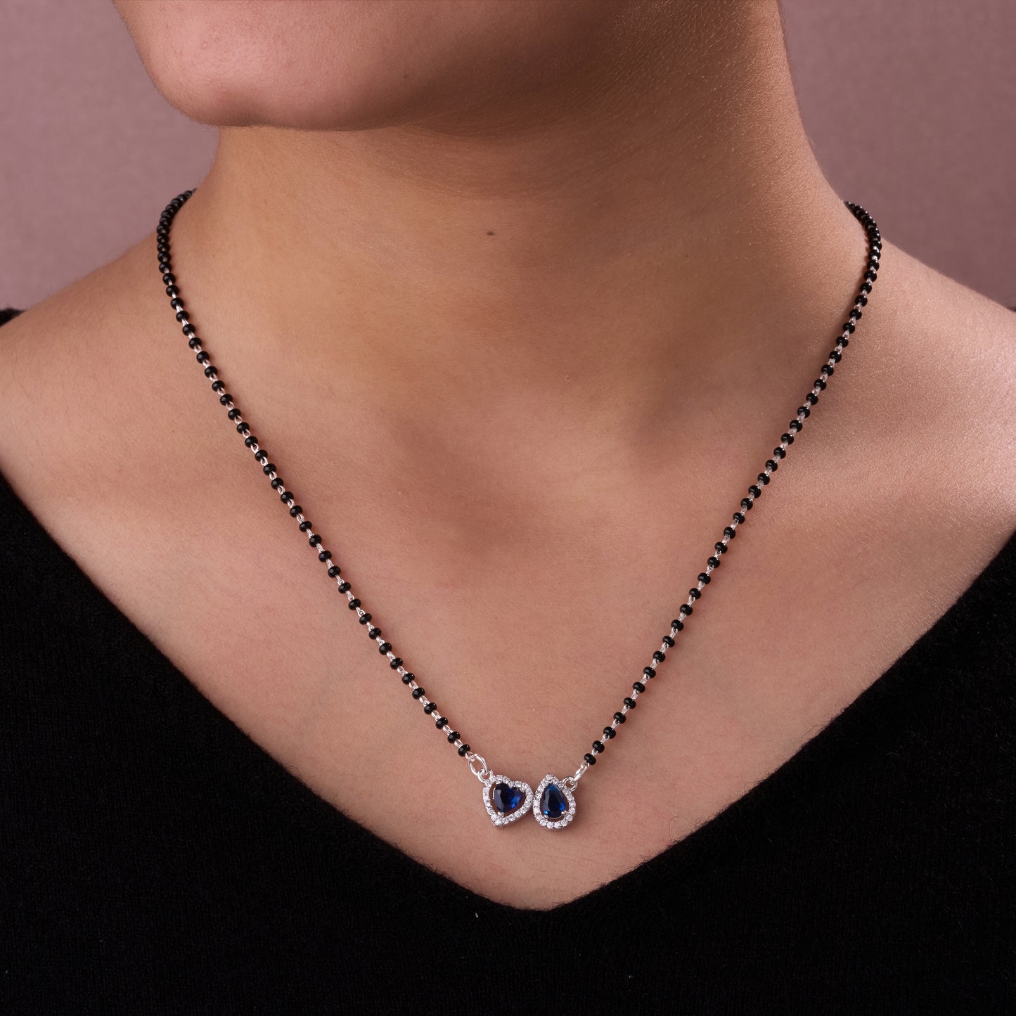 elegant silver-tone mangalsutra with black beads and dual heart & teardrop halo pendants