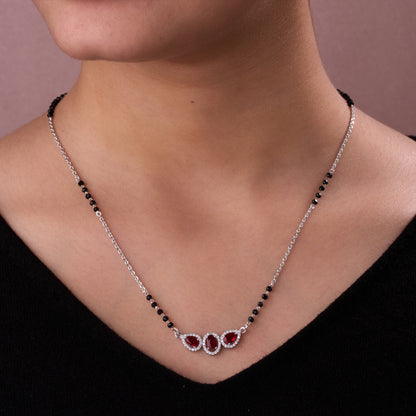 Elegant Silver-Tone Mangalsutra with Black Beads and Triple Blue Teardrop Halo Pendant