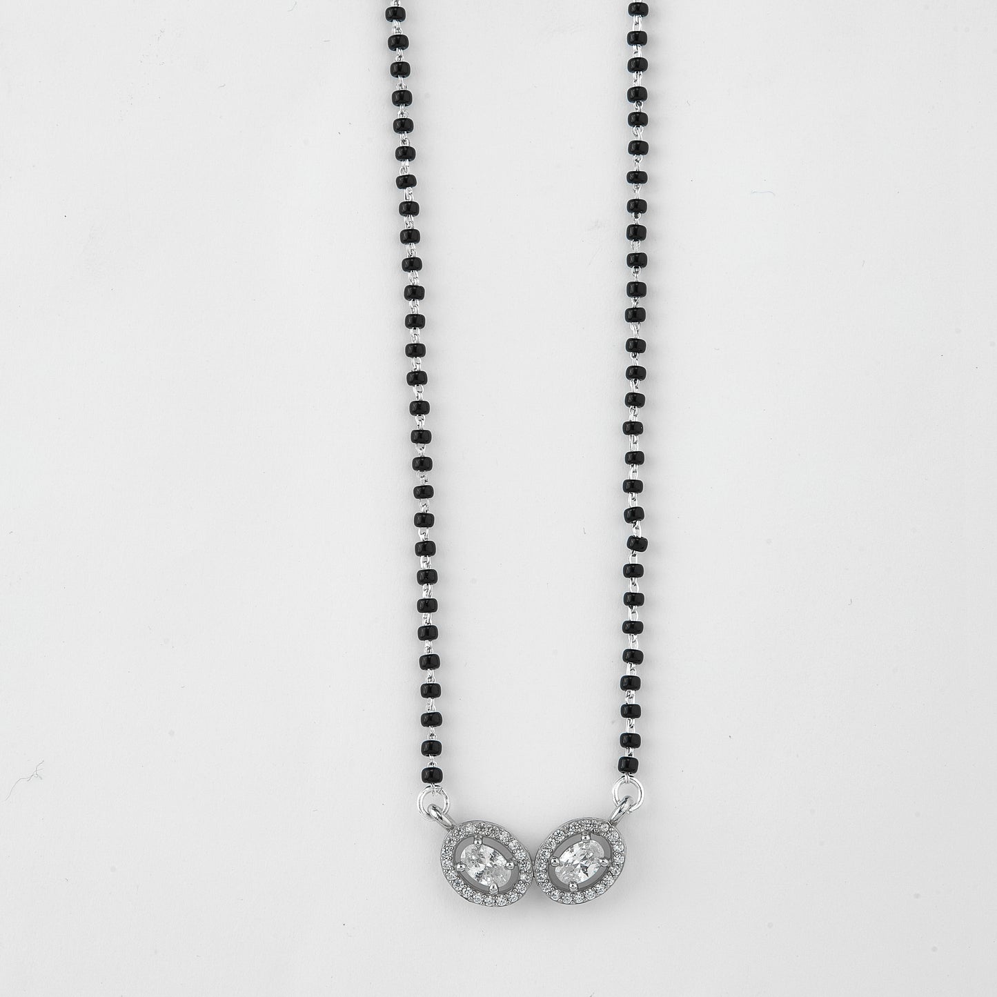 elegant silver-tone dual oval crystal mangalsutra with black beaded chain