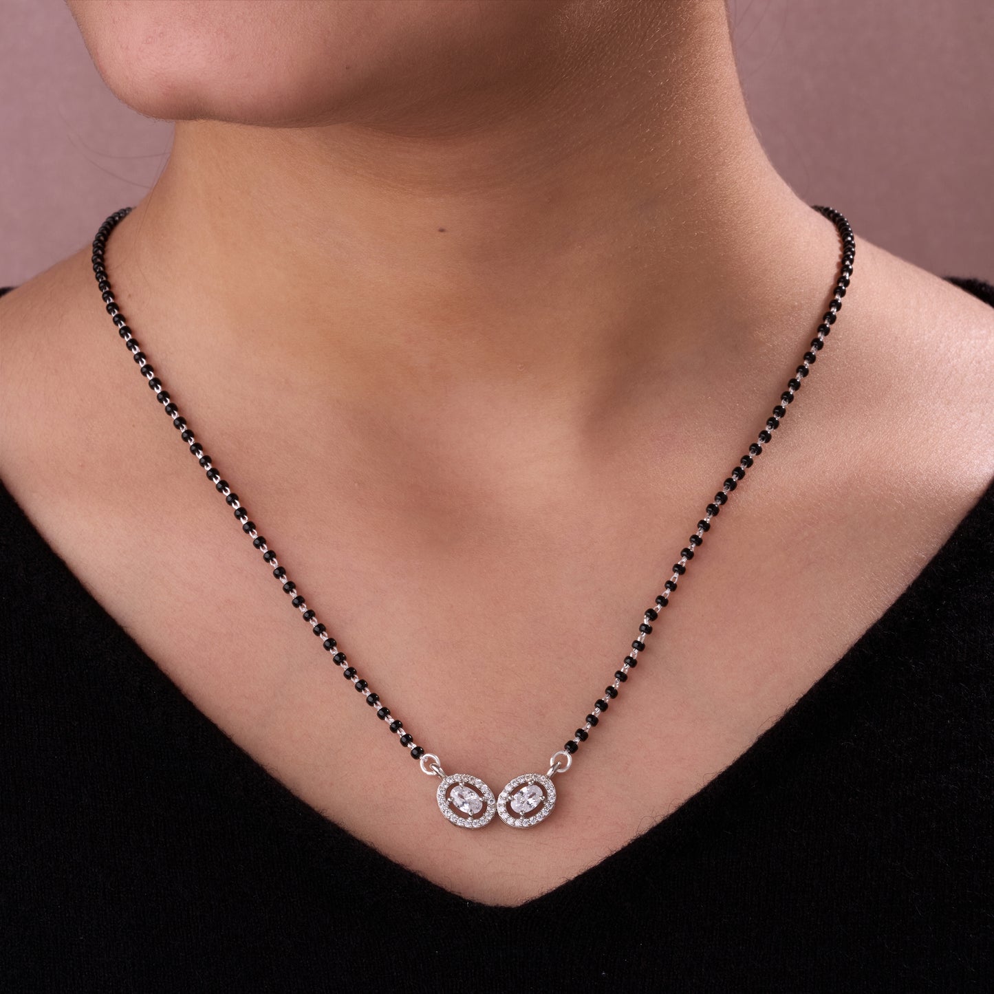 elegant silver-tone dual oval crystal mangalsutra with black beaded chain