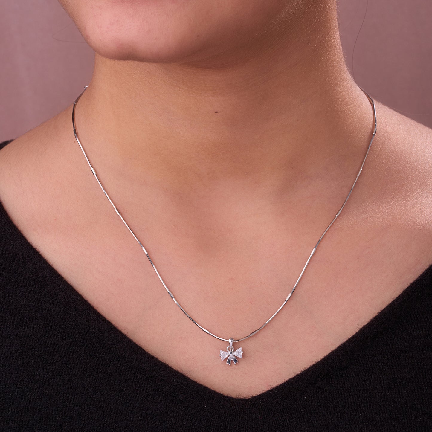 charming bow design cz pendant with matching stud earrings (pendant set only – chain not included)